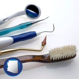 a toothbrush, dental picks, and a mouth mirror - with Arizona icon